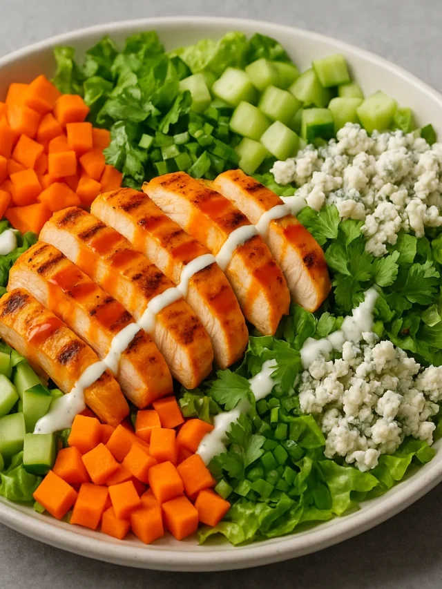 Buffalo chicken salad with grilled chicken, chopped veggies, and creamy dressing