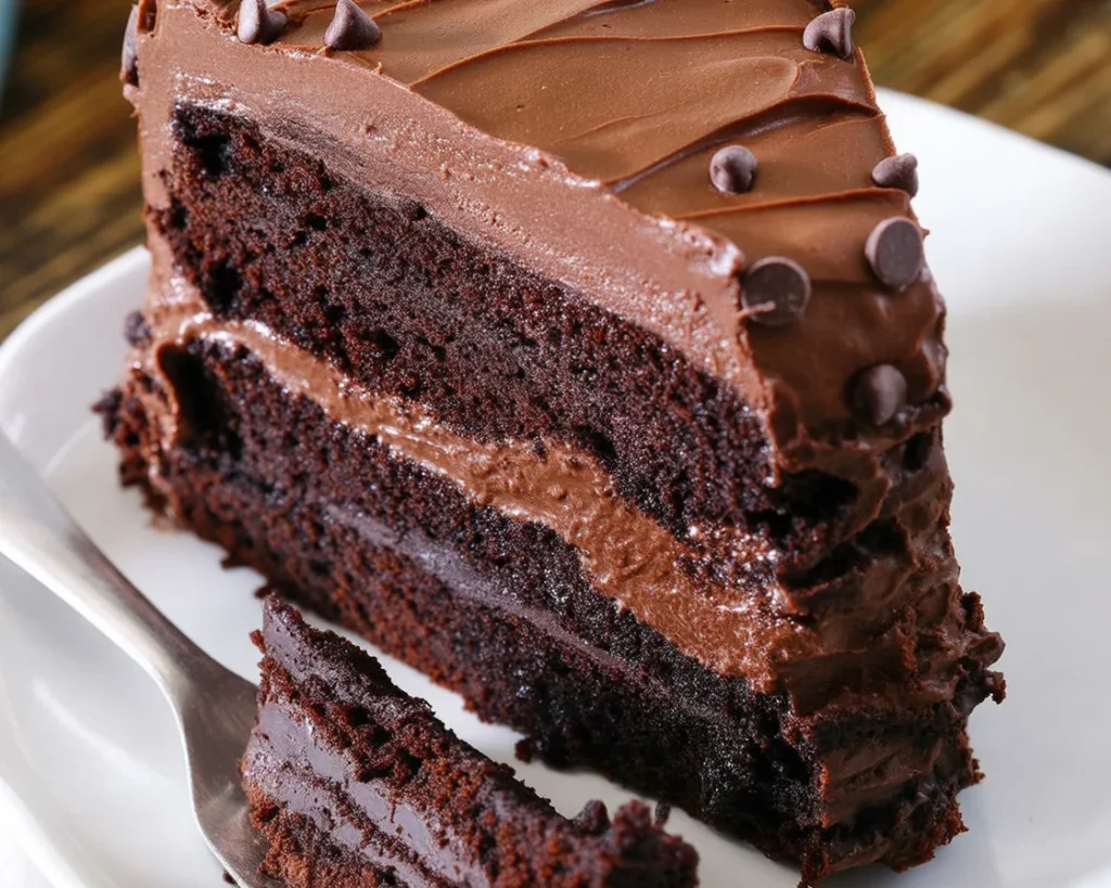 Deliciously rich and moist chocolate cake topped with creamy chocolate buttercream