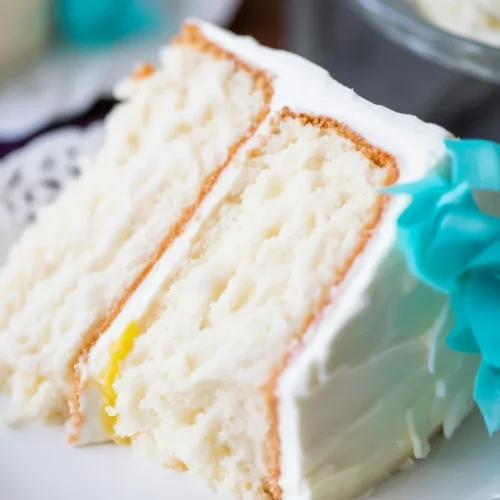 Variety of delicious desserts made with white cake mix including cookies, cupcakes, and cakes.