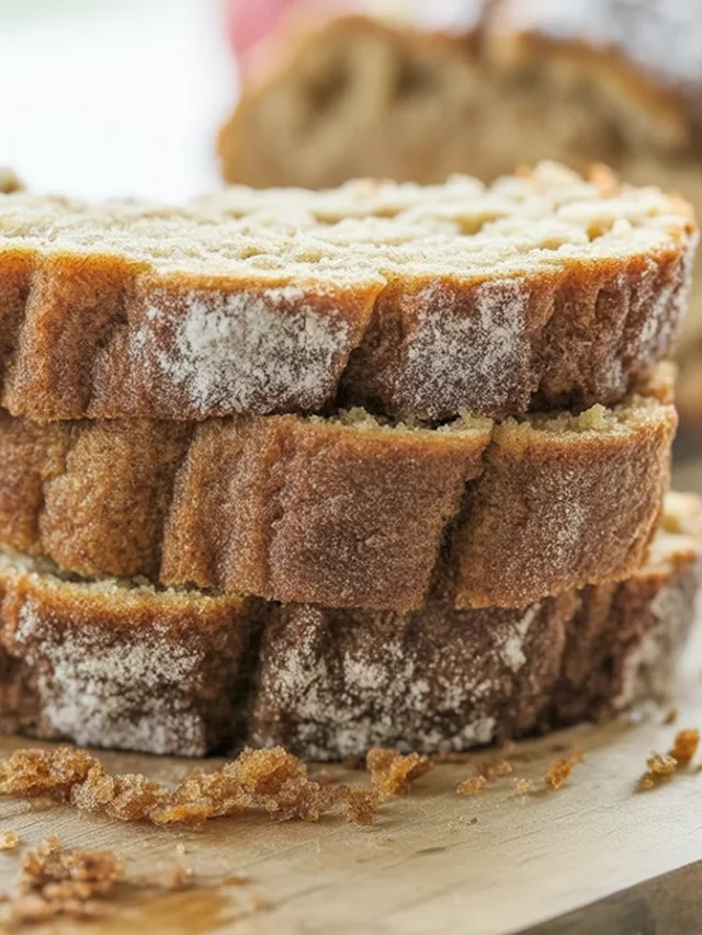 A delicious loaf of Apple Cider Donut Bread with cinnamon sugar topping.