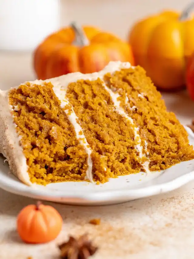 Gooey November Cake served with salted butter tea in a cozy café setting.