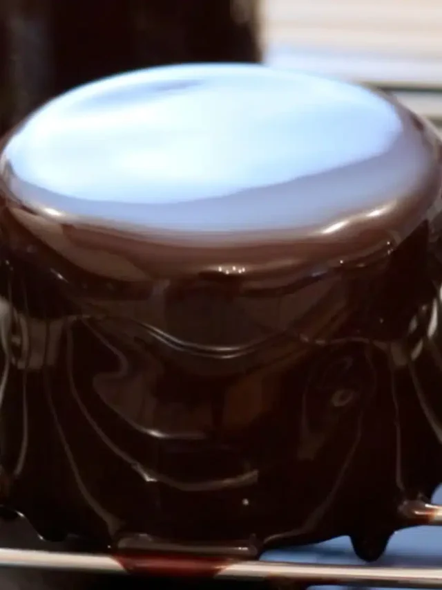 Glossy Chocolate Mirror Glaze Cake Decoration for an elegant dessert finish.