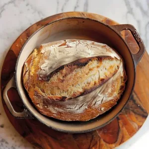 Dutch Oven Sourdough Bread 3 Freshly baked Dutch oven sourdough bread with a crispy crust