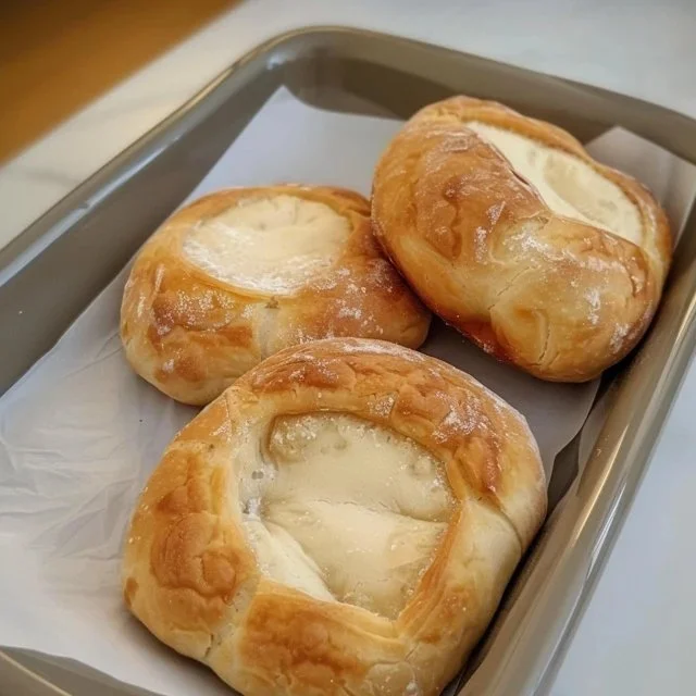 Healthy sourdough discard kolaches with a golden crust and fruity filling
