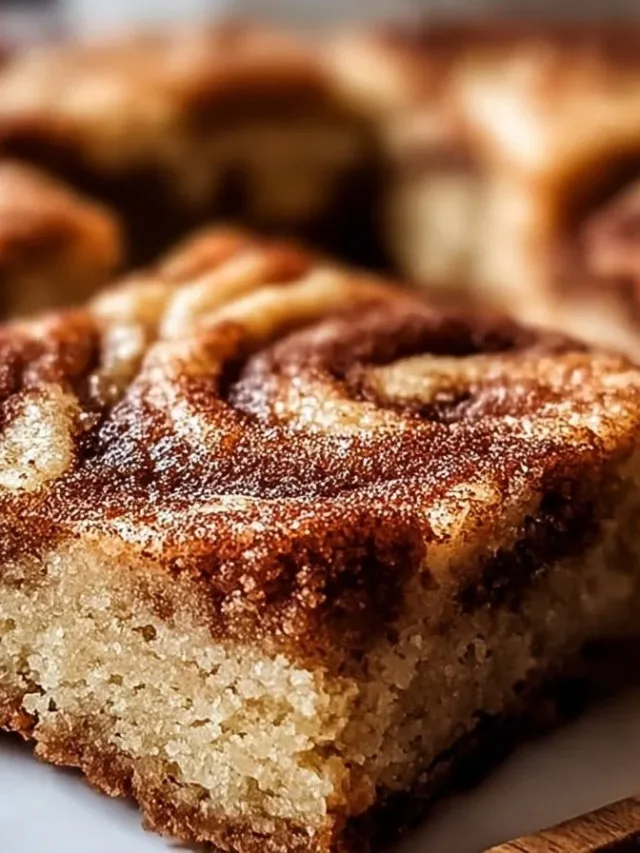 Irresistible cinnamon swirl blondies with snickerdoodle flavors.