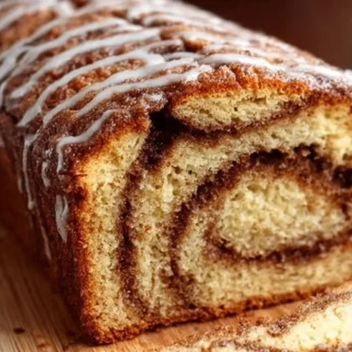 Moist cinnamon swirl loaf baked to perfection with a delicious cinnamon filling.