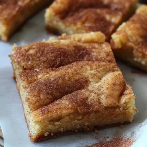 Delicious snickerdoodle bars topped with cinnamon sugar
