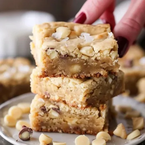 Delicious blondie bars baked to golden perfection with chocolate chips.