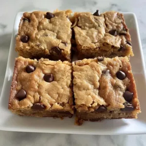 Delicious easy sourdough discard blondies on a wooden table
