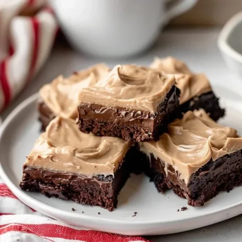 Delicious frosted coffee brownies topped with creamy frosting