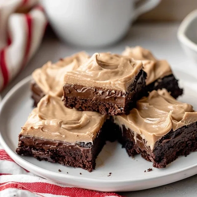 Delicious frosted coffee brownies topped with creamy frosting