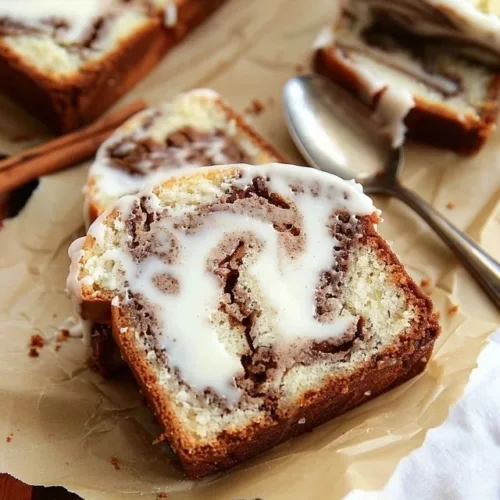 Moist and spiced cinnamon loaf cake with a golden crust
