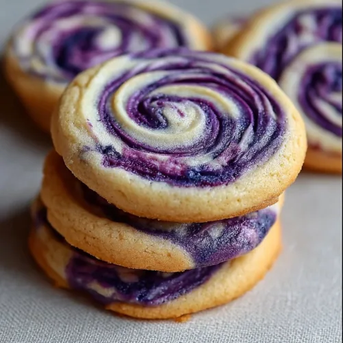 Delicious blueberry cheesecake swirl cookies with a decadent creamy filling