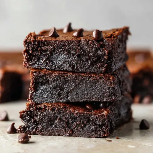 Healthy cottage cheese protein brownies topped with chocolate