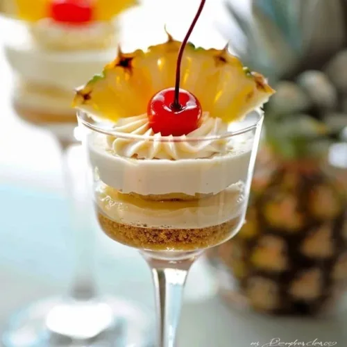 Delicious Pineapple Cheesecake Cups served in a dessert dish