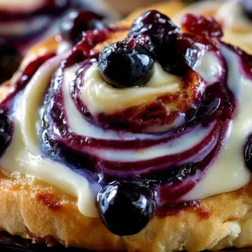 decadent blueberry cheesecake rolls 2026 06 11 201129 1024x574 1 Decadent Blueberry Cheesecake Rolls