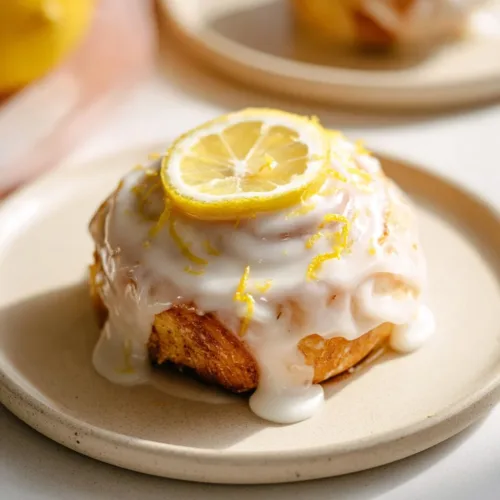 Tray of easy Lemon Sweet Rolls drizzled with lemon glaze