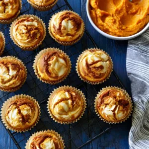 Delicious pumpkin cream cheese muffins fresh out of the oven