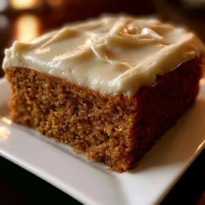 Pumpkin Sheet Cake With Cream Cheese Frosting 2 Delicious pumpkin sheet cake topped with creamy frosting, perfect for fall desserts.