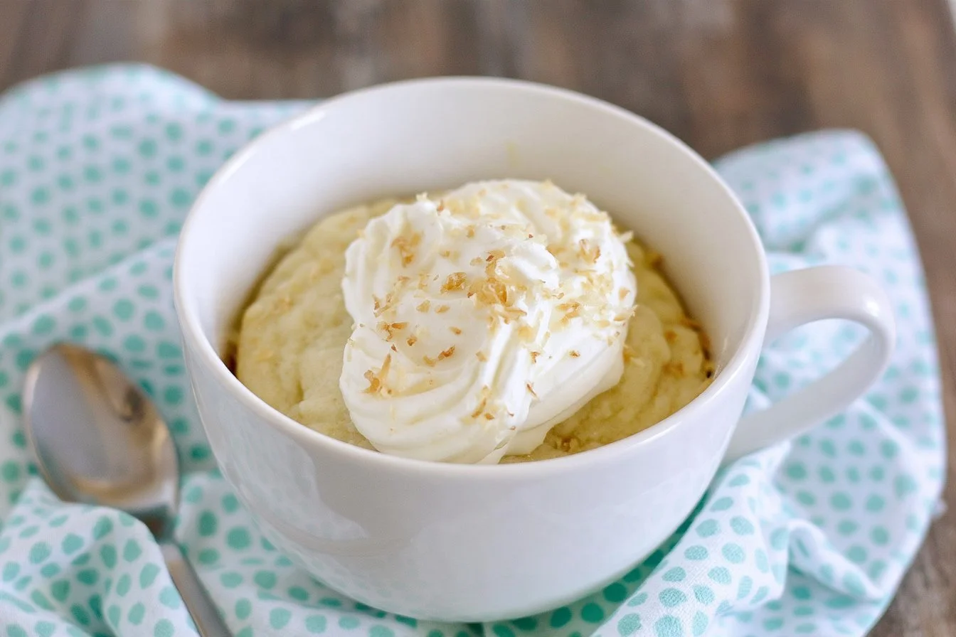 quick-coconut-cake-in-a-mug-2026-10-01-160609 Quick coconut cake baked in a mug, perfect for a fast dessert option.